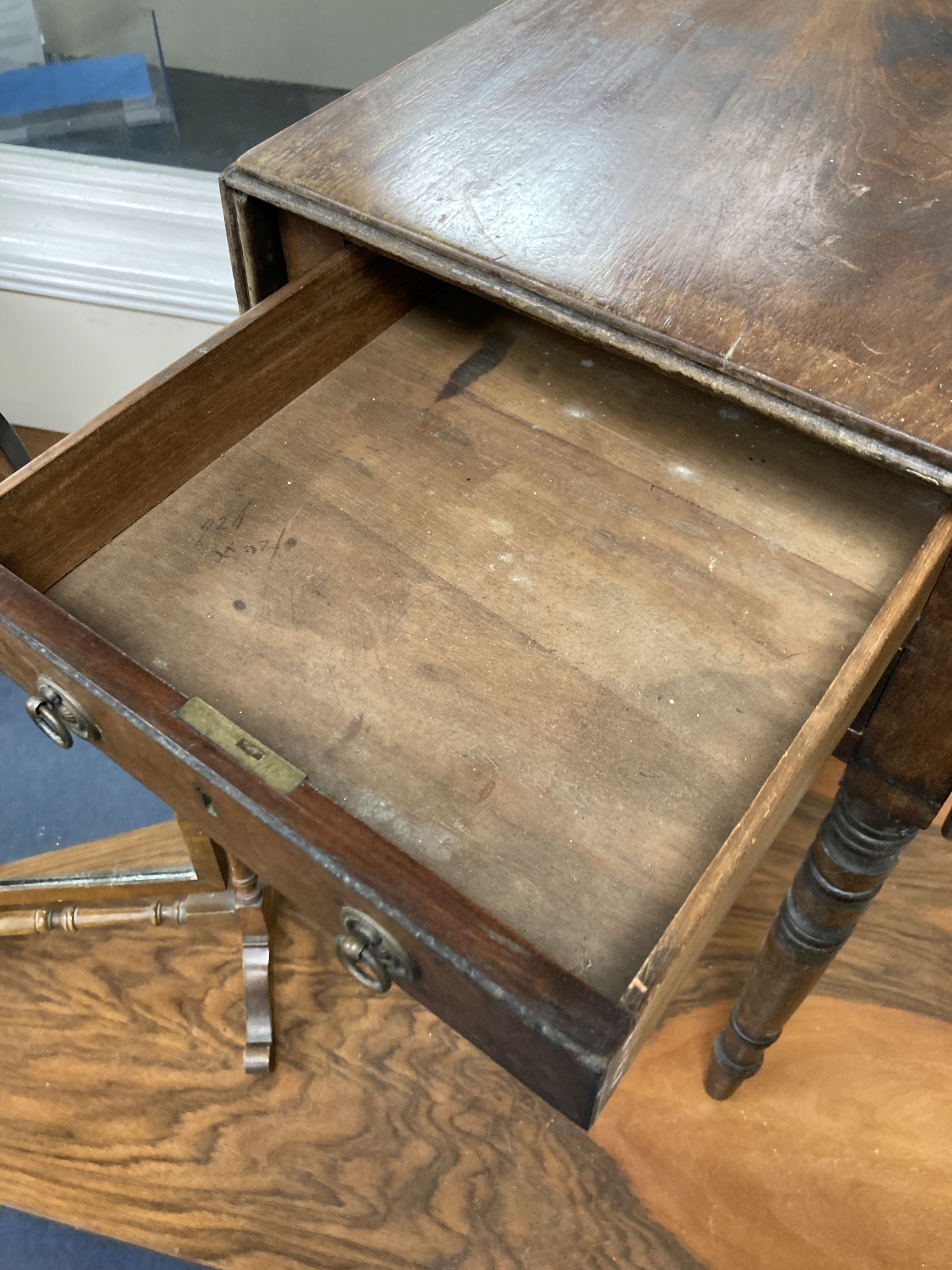 A Regency mahogany drop flap work table, width 38cm, depth 51cm, height 67cm together with a later toilet mirror